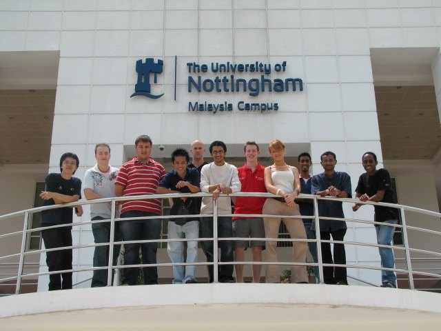 David Marsden with freinds outside the main Admin Building at the Malaysia Campus